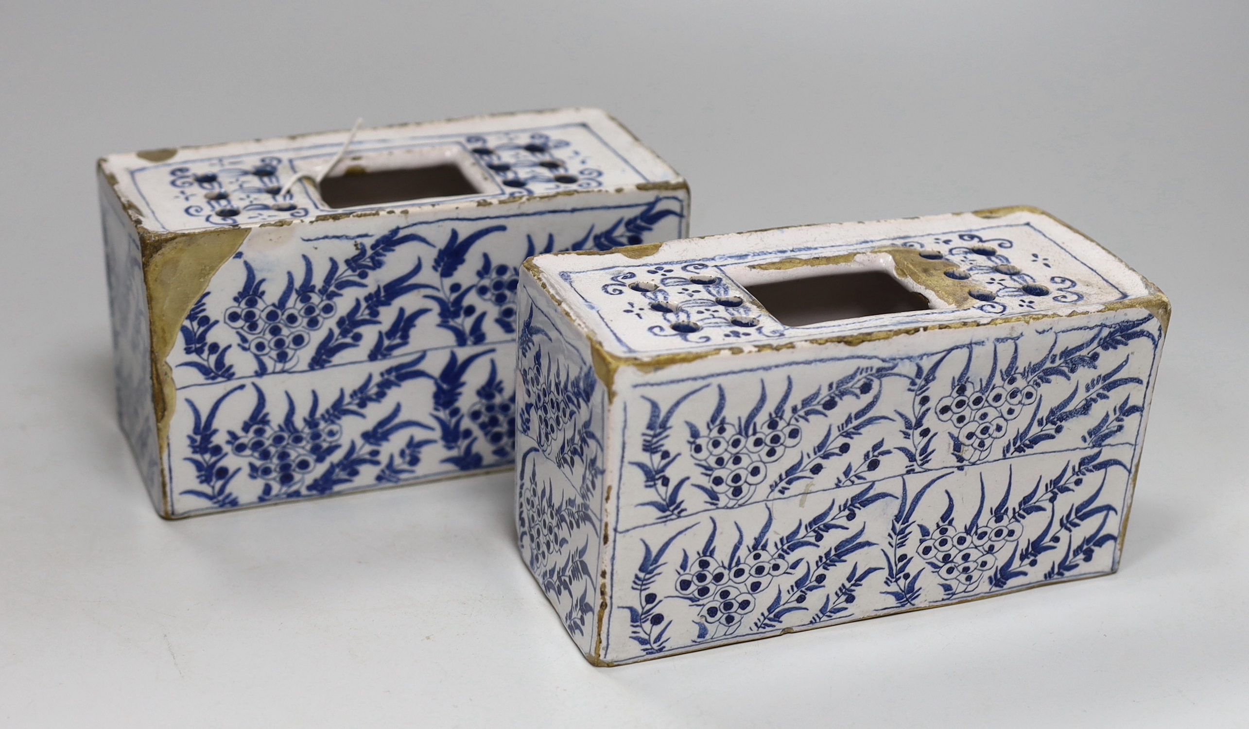 A pair of 18th century Delft flower bricks, 9.4cm high